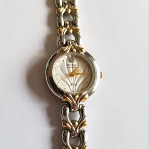 Vintage Armitron Now ladies wristwatch gold silver tone fancy bracelet